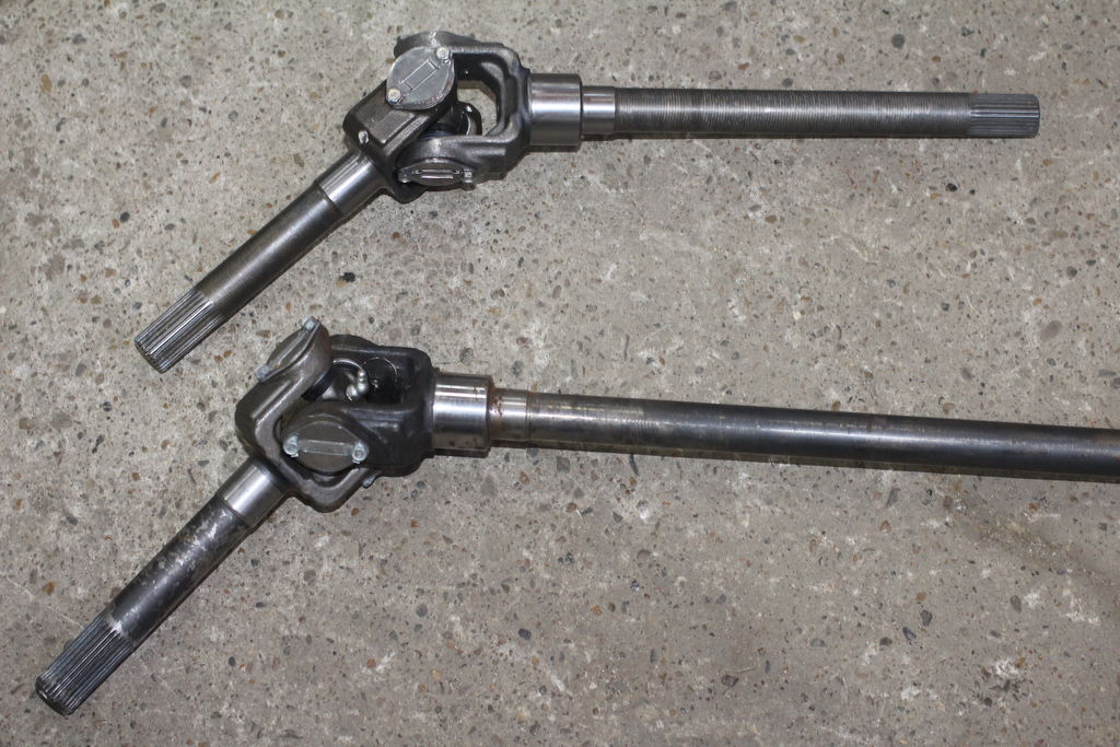 Шрус передний левый газ соболь. Полуось переднего моста газели. Привод переднего моста газель 4х4. Шарнир поворотного кулака соболь 4х4 левый короткий 23107-2304061 шрус. Полуоси переднего моста рексто1.
